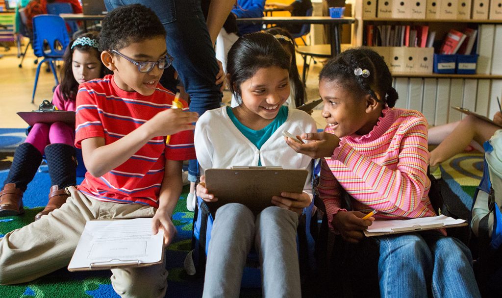 Students work together on math problem